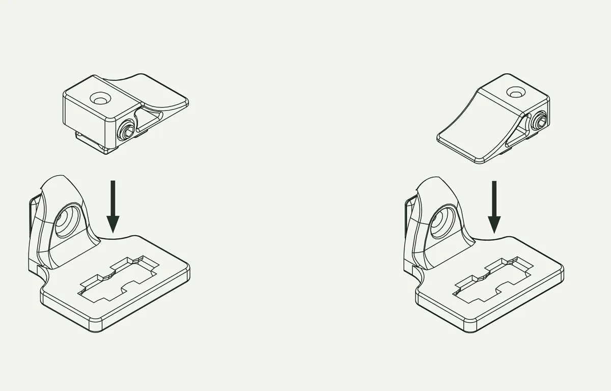 Een spanwigje wordt in een lege QuickFit-steun geklikt, links en rechts